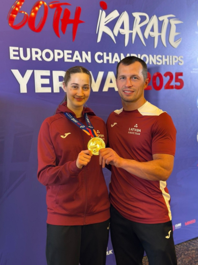 Beata Girvica ar treneri