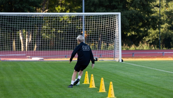 Futbolists stadionā