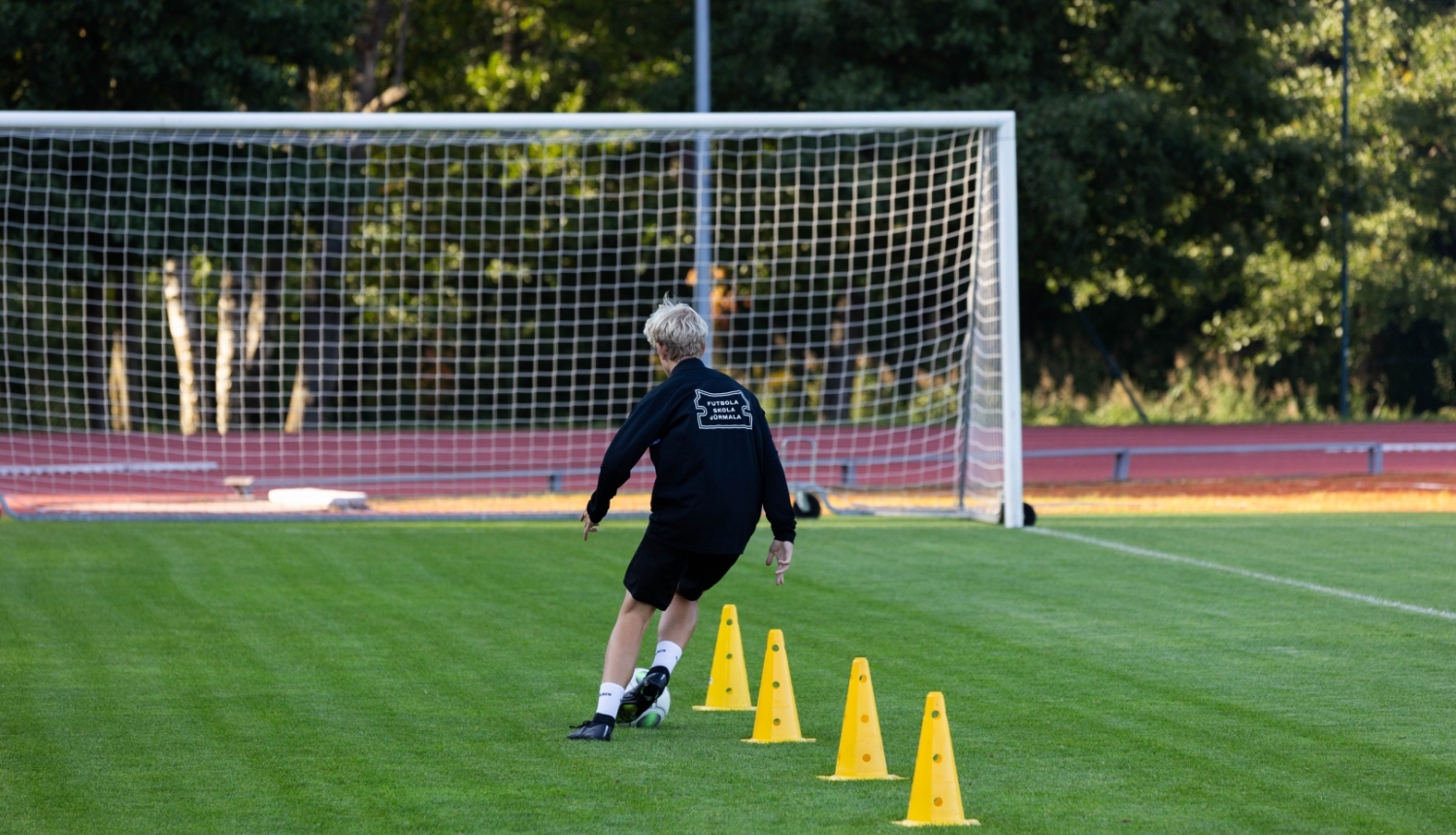 Futbolists stadionā